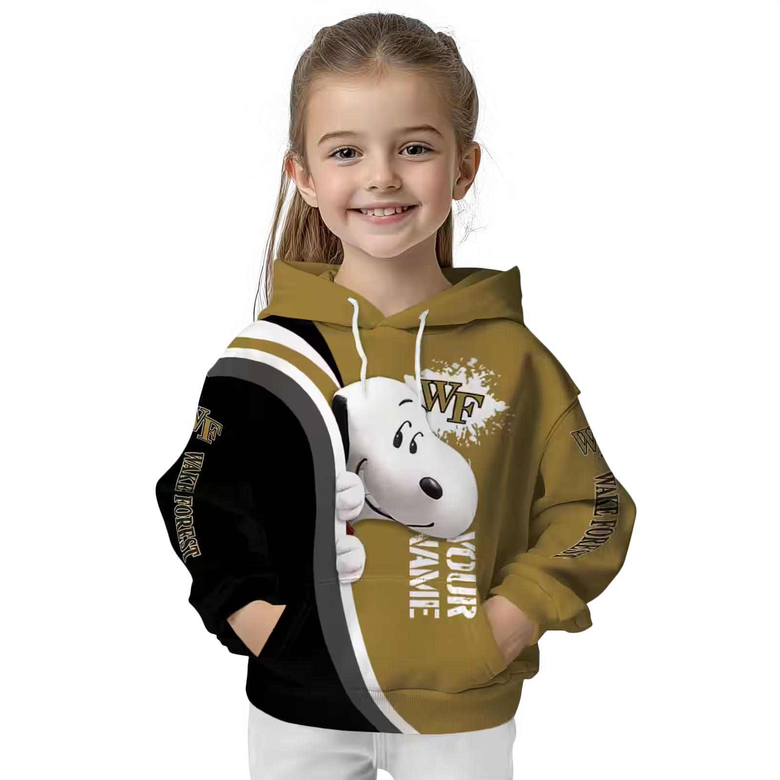 personalized wake forest demon deacons peeking snoopy gold hoodie top rated