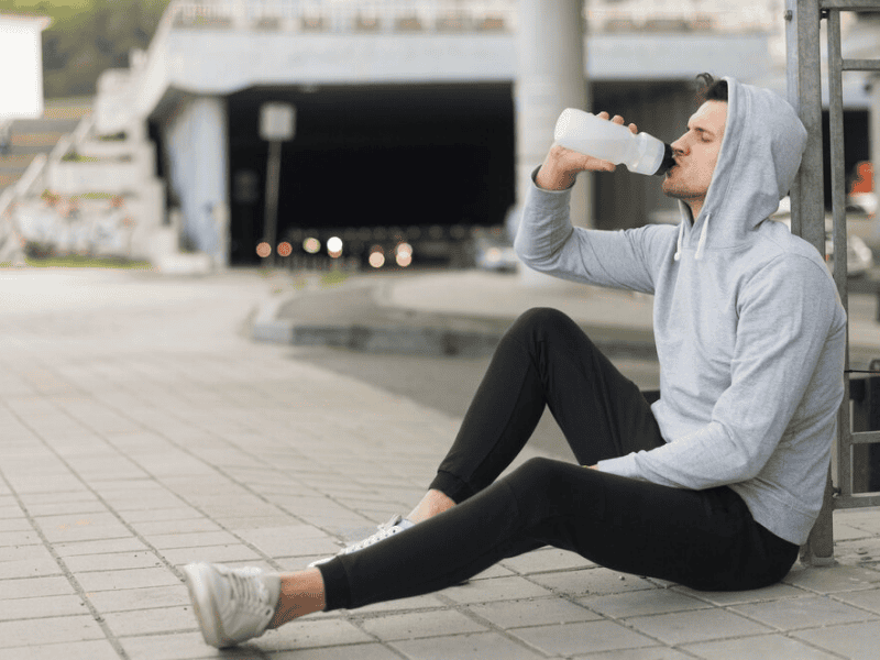 Stay hydrated before, during, and after your workout, especially when wearing a hoodie Stay hydrated before, during, and after your workout, especially when wearing a hoodie